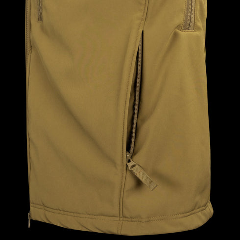 Close-up of the Condor Phantom Softshell Jacket in tan, showcasing a side vertical zippered pocket with a pull tab.